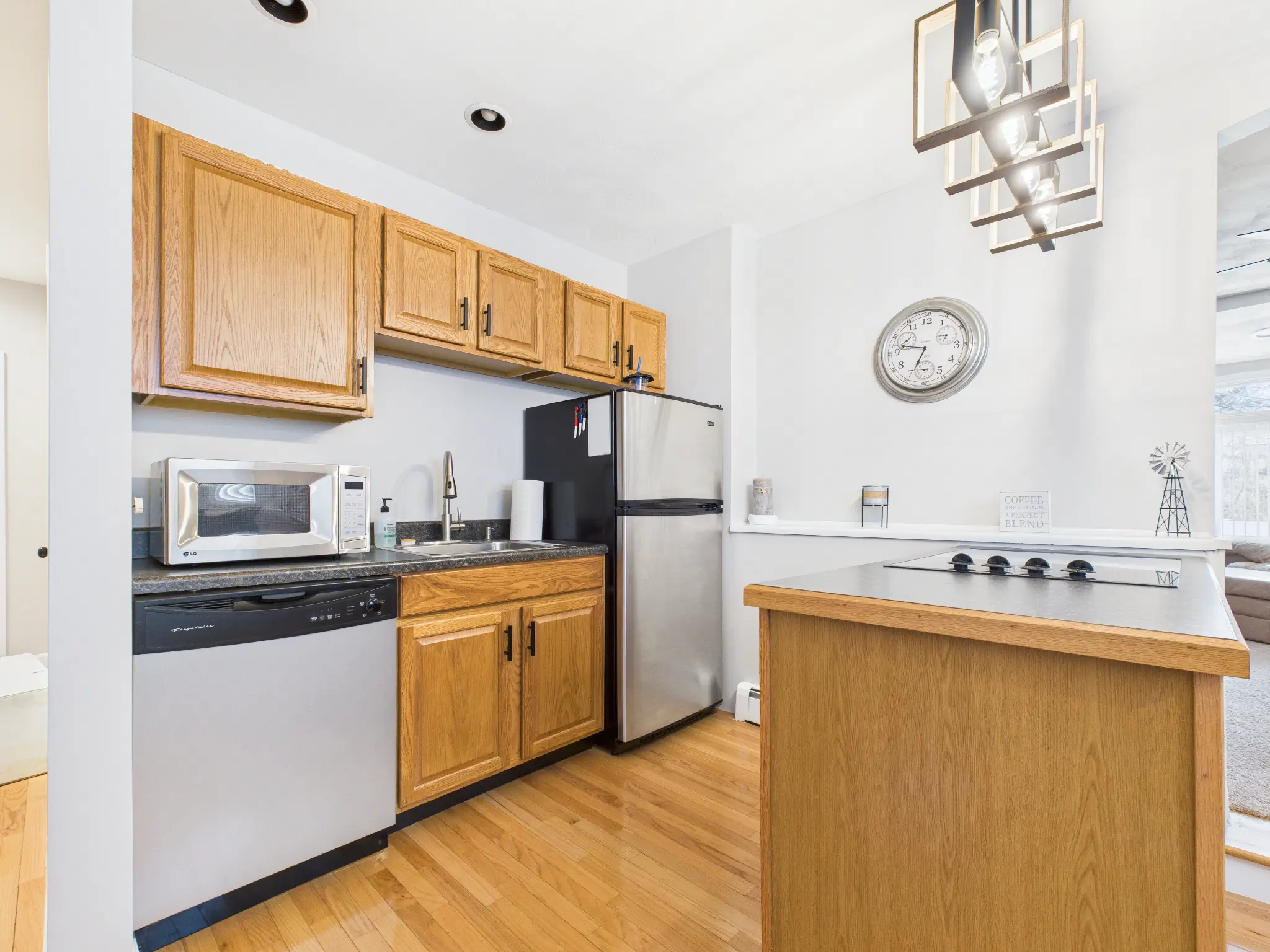 Lower-level kitchen and dining listing photography sample
