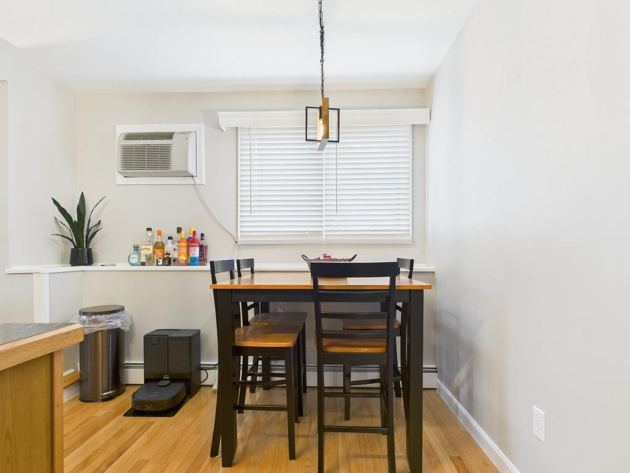 Lower-level kitchen and eating area real estate photography sample